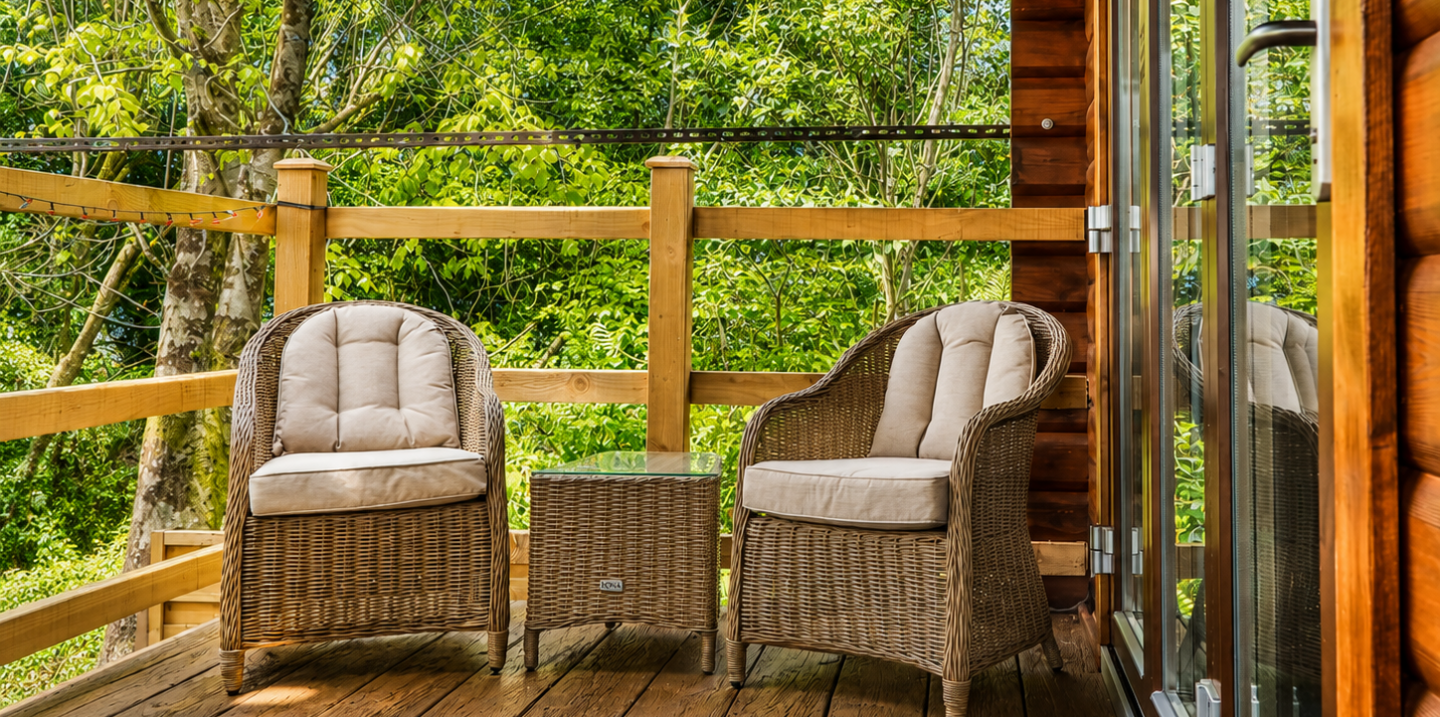 Cozy wooden balcony with lush greenery