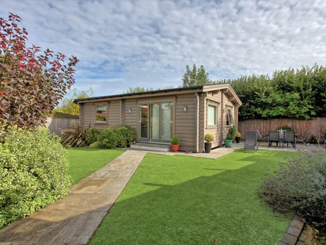 Granny Annexe at the bottom of a suburban garden with a path leading to the front door